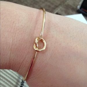 Gold tone knot bracelet and earring set